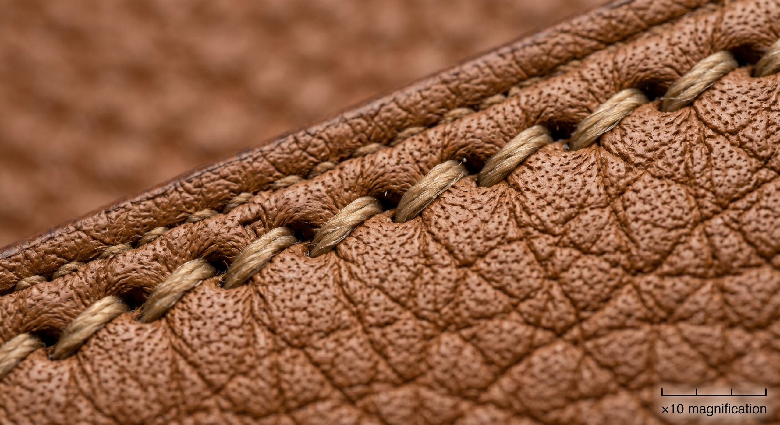 Authentic Hermes saddle stitch 45 degree angle loupe magnification detail