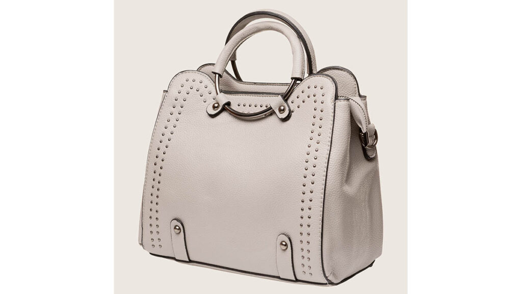 A soft leather bag with rolled top handles, representing the relaxed silhouette compared across Lindy sizes