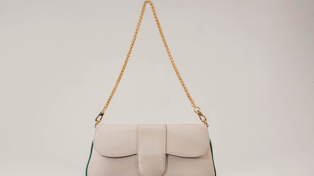 Hermes Birkin vs Kelly: Construction and Leather Comparison Structured luxury leather handbag showing panel construction