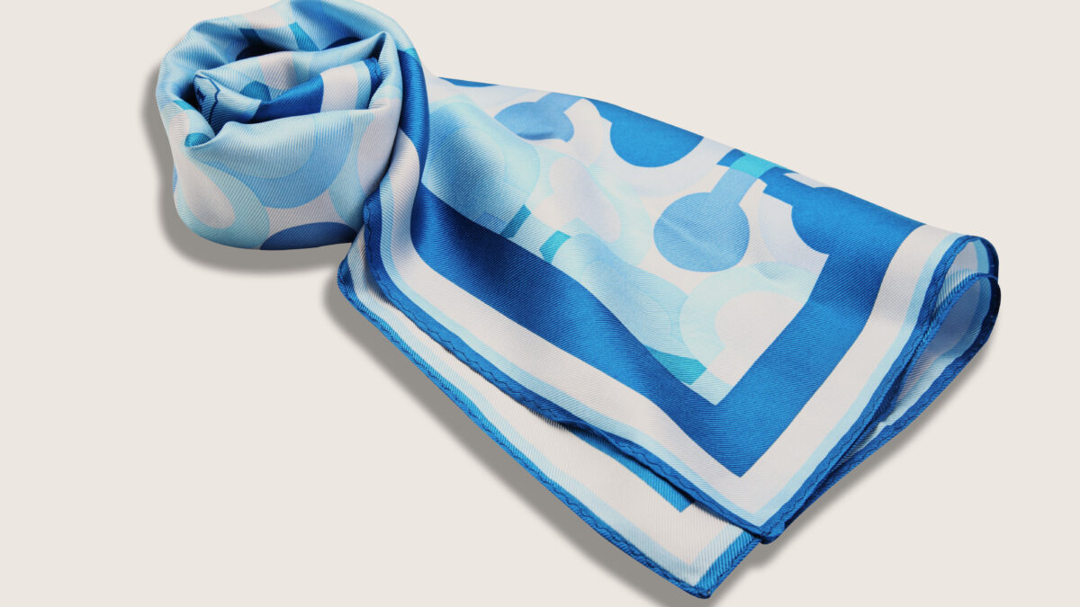 Folded silk scarf presented as a birthday gift idea