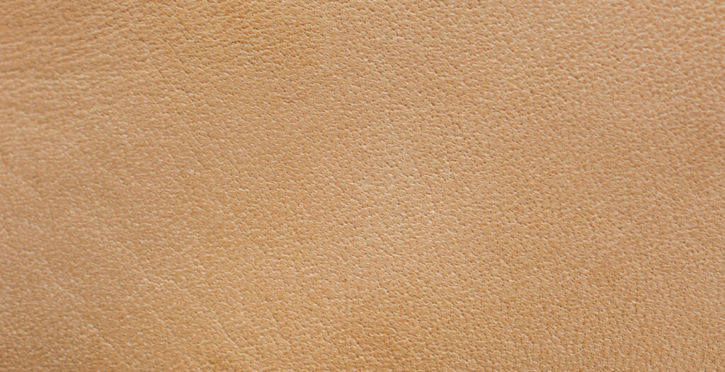 Does Hermes Epsom Leather Soften With Use? A Long-Term Study Close-up of embossed leather grain, illustrating the structured texture examined in the Epsom leather softening study