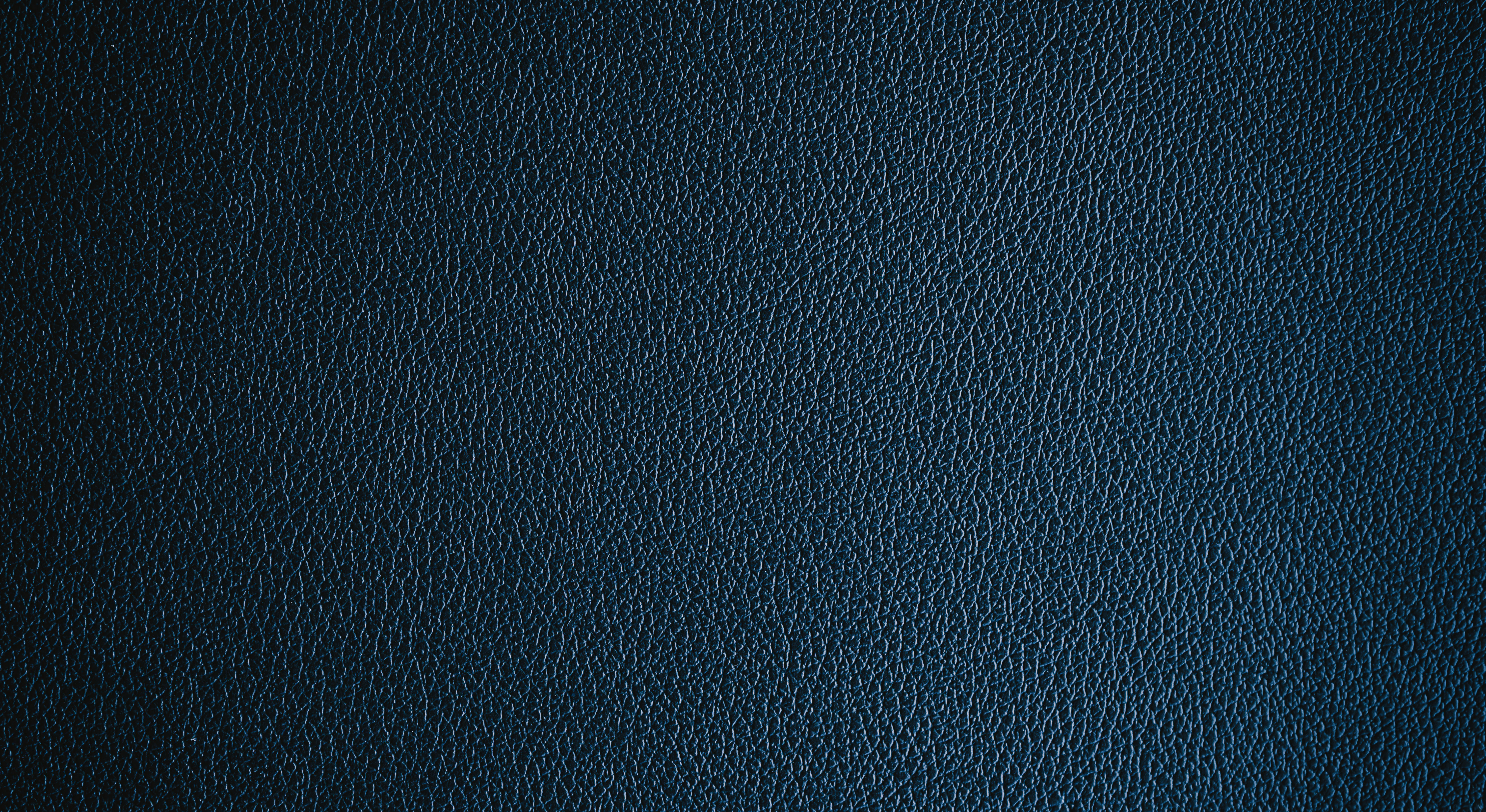 Close-up of smooth leather grain, illustrating the surface qualities compared between Epsom and Swift for daily use