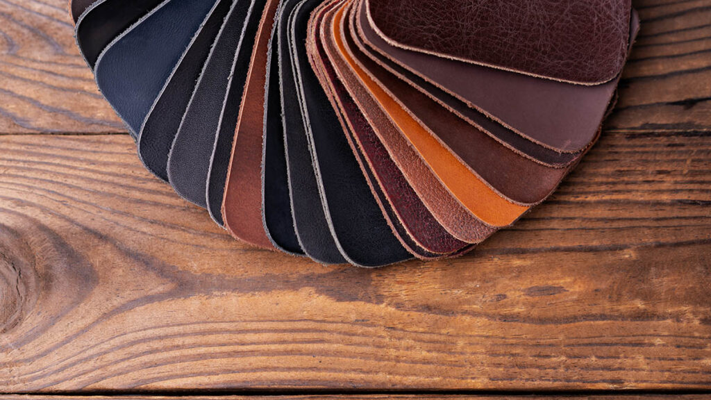 How Leather Knowledge Gives Hermes Buyers a Boutique Advantage Rows of Hermes leather swatches in different colors used for palette selection at the boutique counter