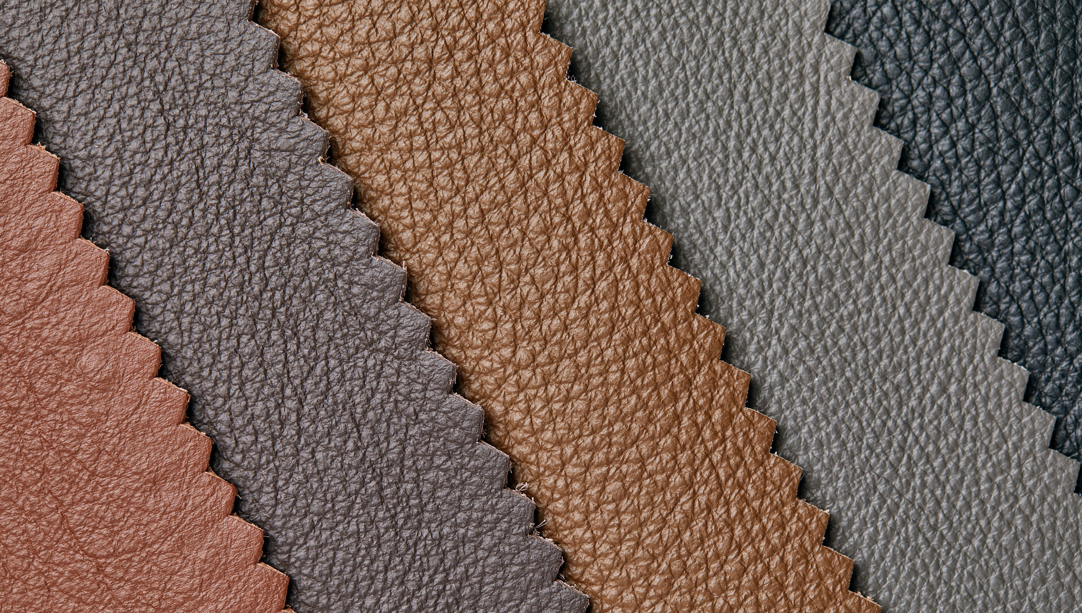 Assorted leather samples in different colors and finishes, representing the range of leather types compared for resale value