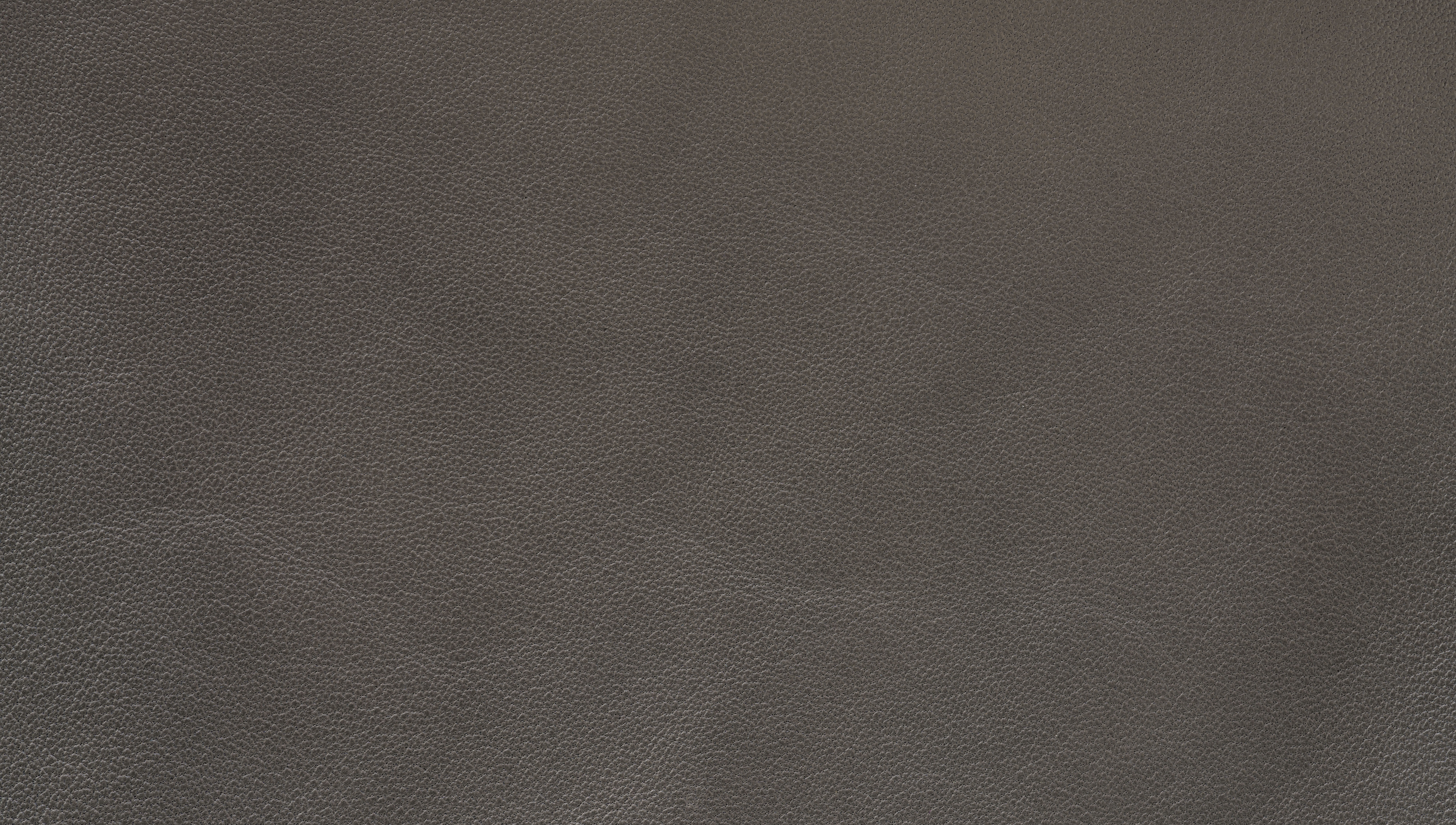 Close-up of soft pebbled leather grain, illustrating the texture behind why Togo and Clemence leathers slouch differently