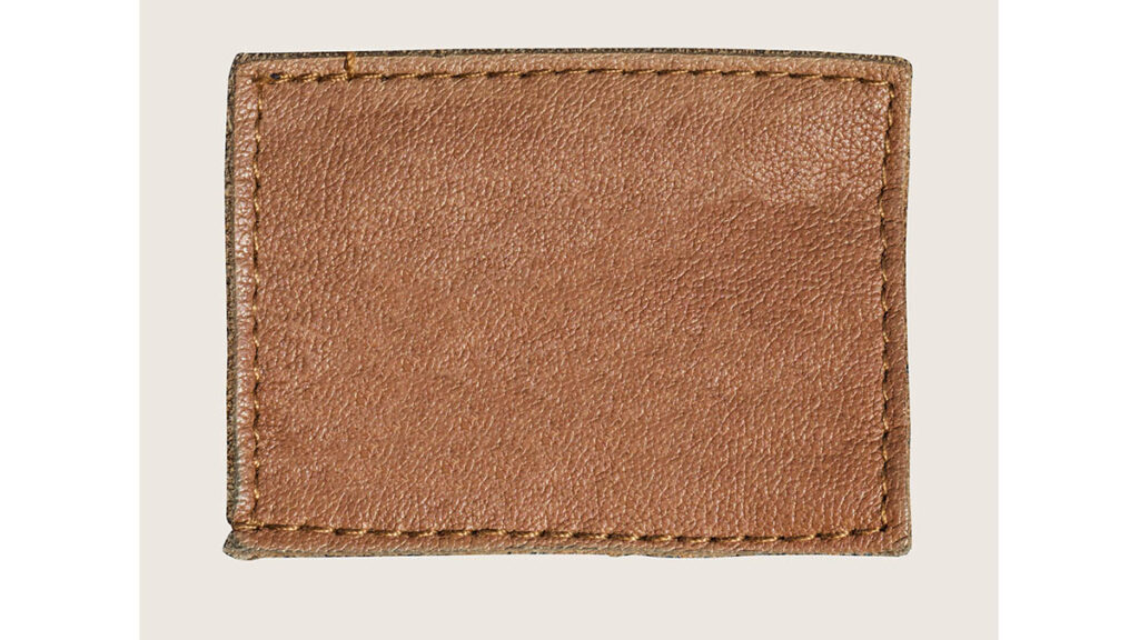 Authentic Hermes Resin Edge Glazing Thickness: What to Look For Close-up of leather edge finish showing grain and stitching