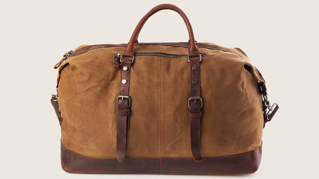 Traveling With a Hermès Bag: Protecting Corners and Handles Leather travel bag shown intact, representing the corners and handles that need protection while traveling